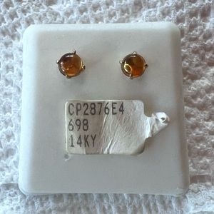 14K white gold earrings in cabachon yellow topaz.